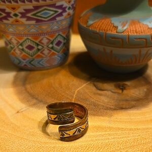 Copper and sterling silver ring.